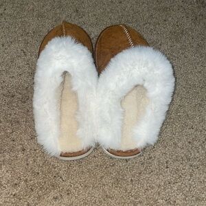 brown and white slippers